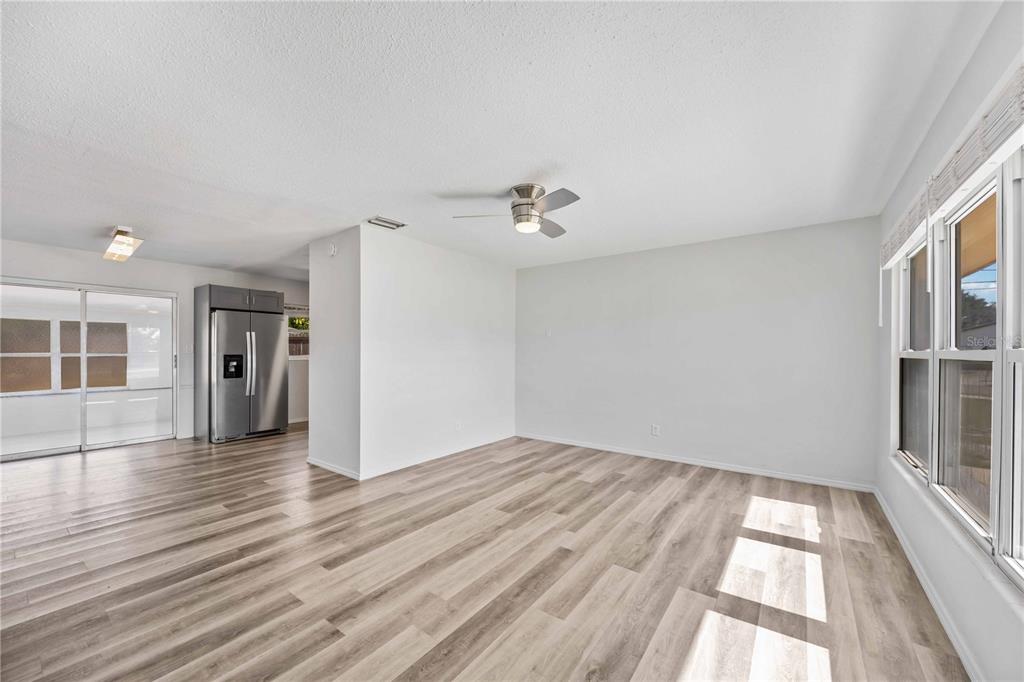 6319 Lafayette Road Bradenton, FL 34207 - Photo 7 of 30 wooden floor in an empty room with a window