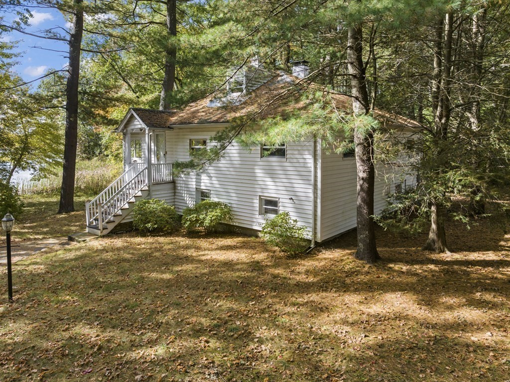 44 None Such Way Weston, MA 02493 - Photo 11 of 11 a view of a house with a yard