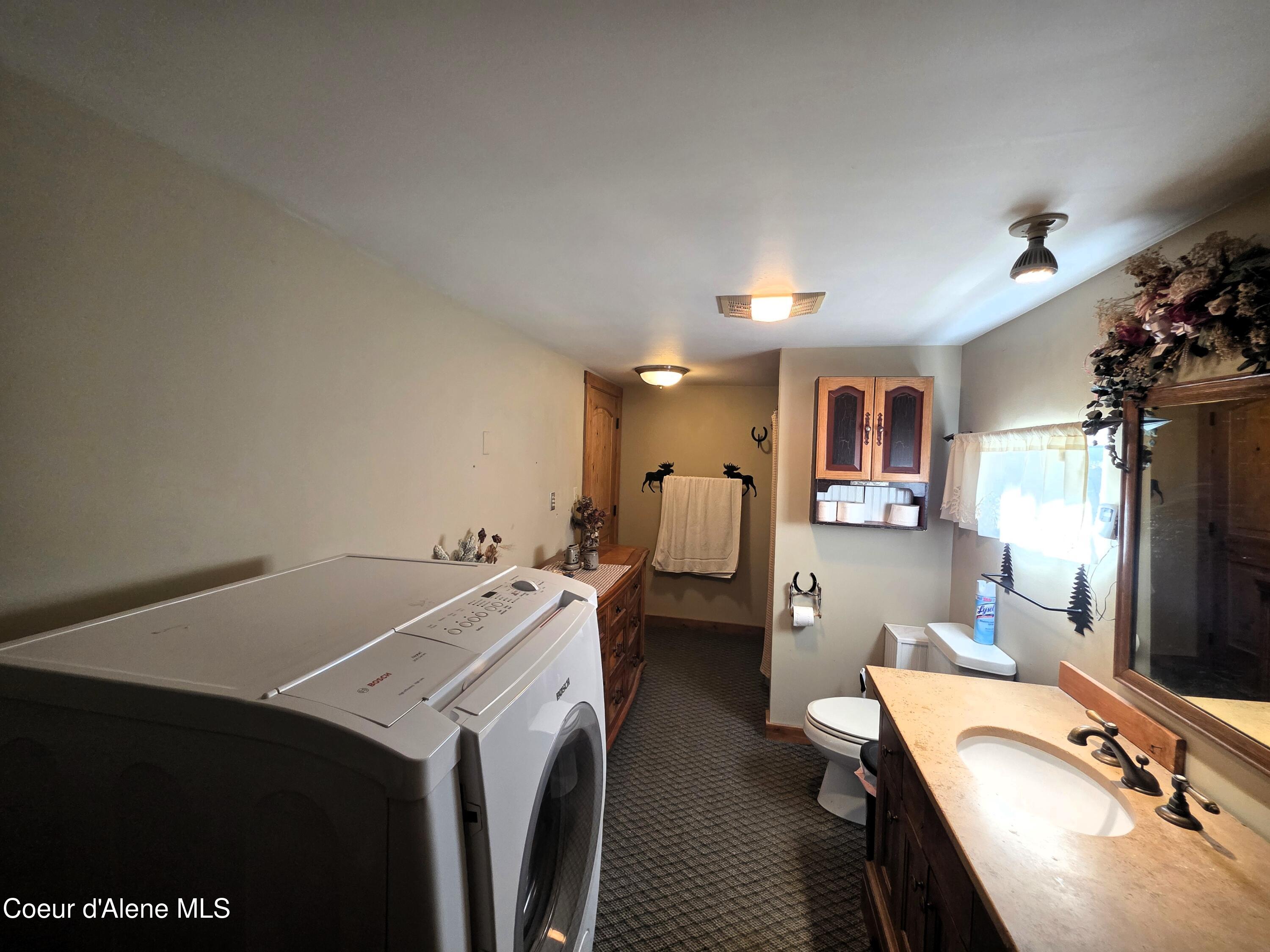 1957 Homestead Road Athol, ID 83801 - Photo 13 of 38 Laundry / Bathroom