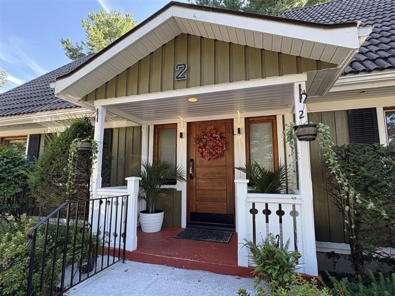 a front view of house with yard