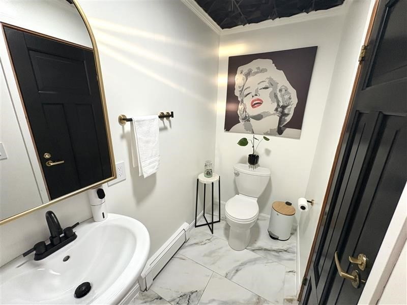 2 Pat Drive Danvers, MA 01923 - Photo 13 of 32 a bathroom with a toilet and a sink