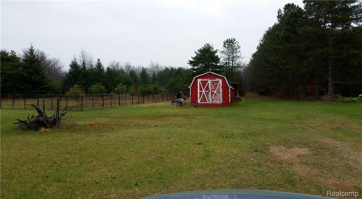 Shed and Fenced Garden Area.  