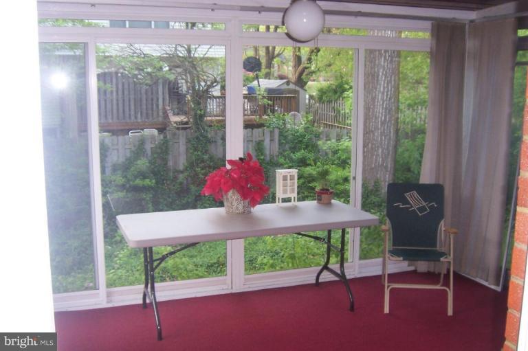 10212 Portland Road Silver Spring, MD 20901 - Photo 4 of 13 a view of a dining room with furniture window and outside view