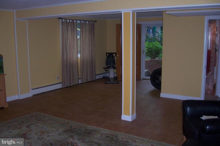 10212 Portland Road Silver Spring, MD 20901 - Photo 6 of 13 a view of a hallway with interior of the house