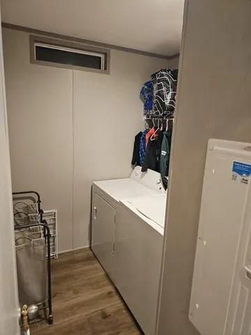 a view of storage and utility room with a sink