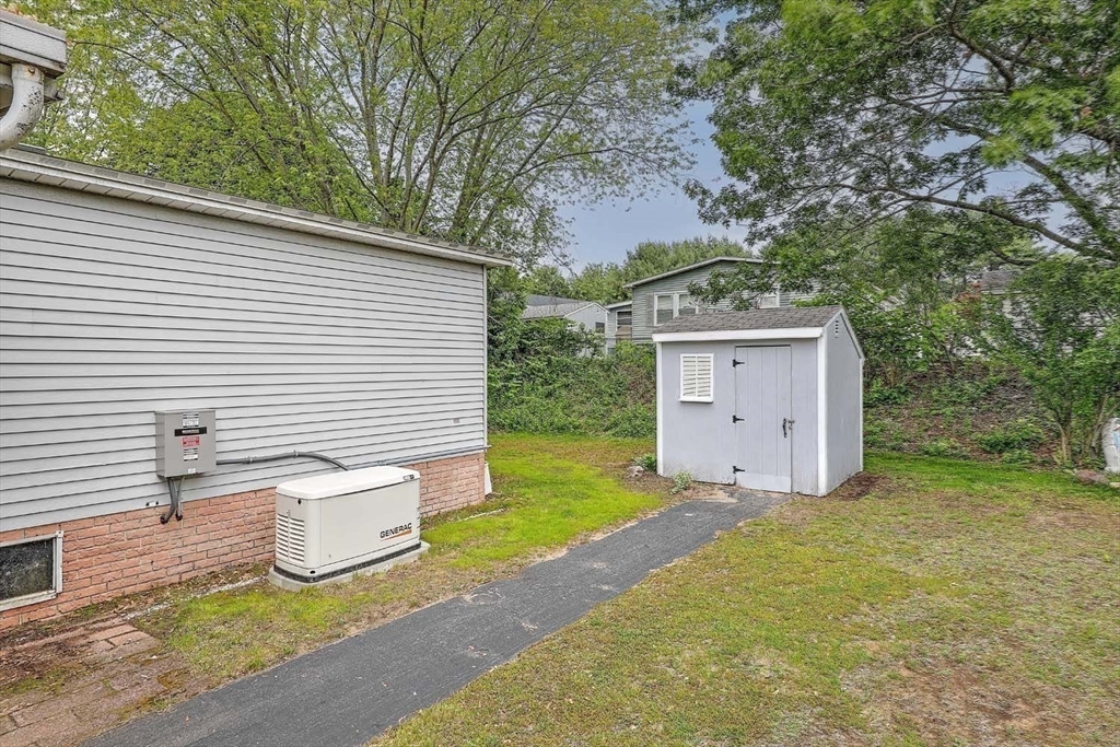7 Queens Road Attleboro, MA 02703 - Photo 22 of 33 a view of a house with backyard and garden