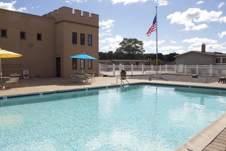 7 Queens Road Attleboro, MA 02703 - Photo 29 of 33 a view of a swimming pool with a lake