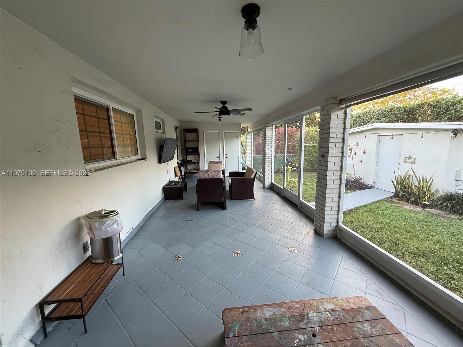 4850 Southwest 4th Street Miami, FL 33134 - Photo 16 of 28 a living room with furniture