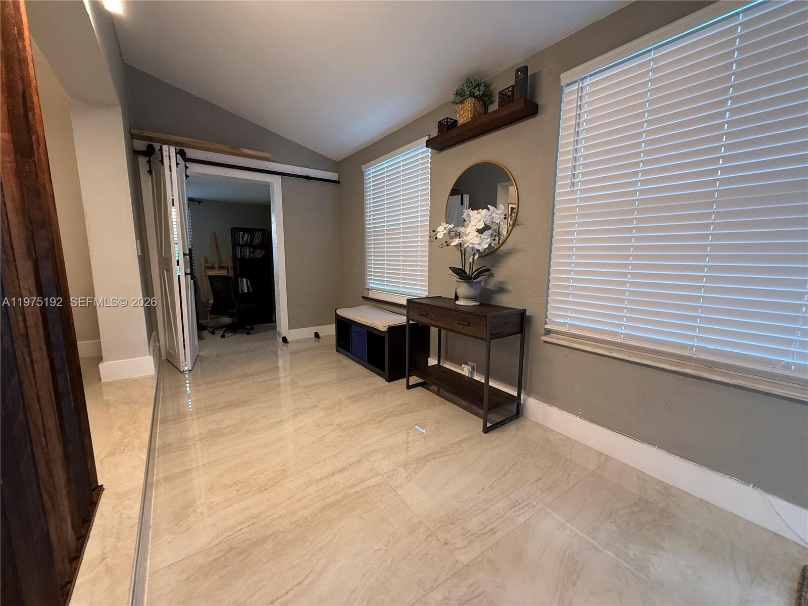 4850 Southwest 4th Street Miami, FL 33134 - Photo 4 of 28 a view of a livingroom with a fireplace