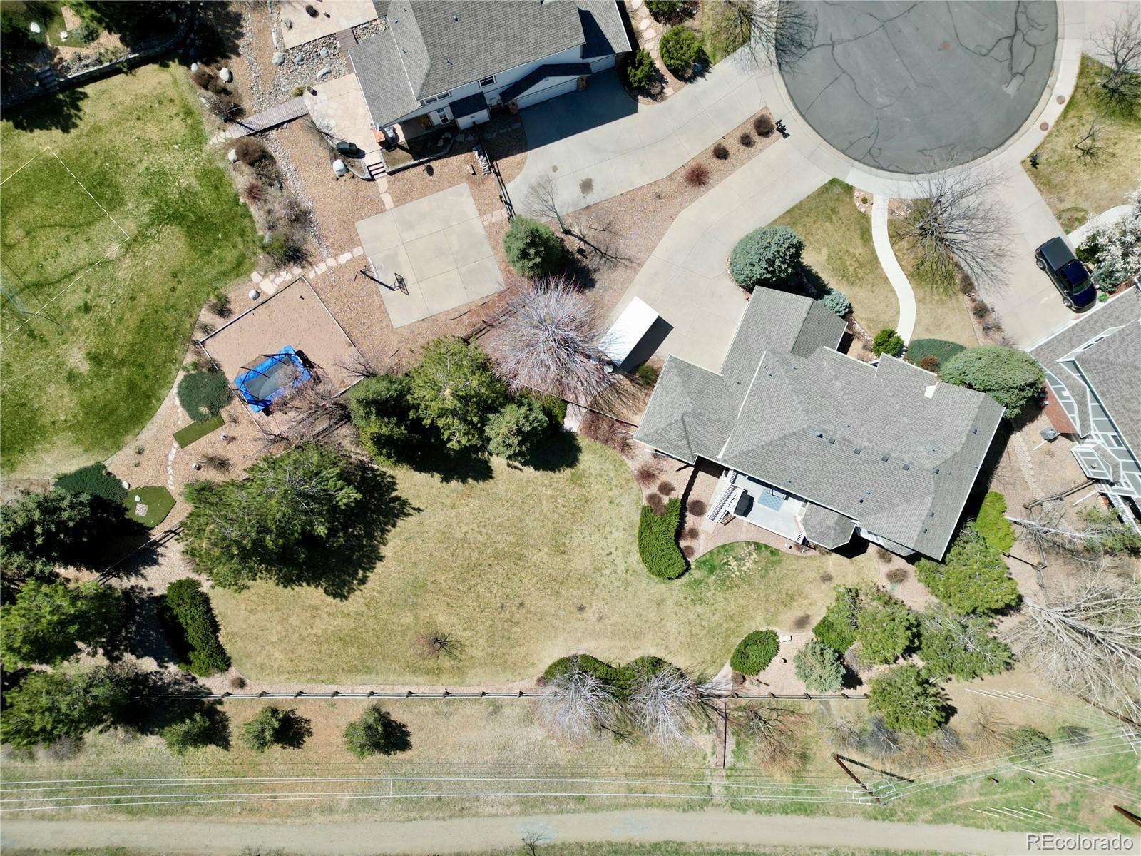 18288 East Caley Place Aurora, CO 80016 - Photo 2 of 50 an aerial view of a house with a yard