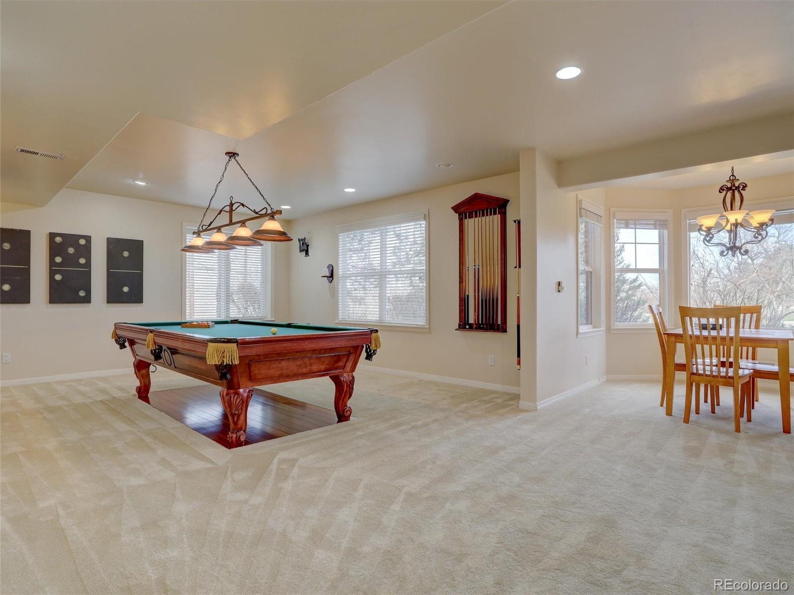 18288 East Caley Place Aurora, CO 80016 - Photo 29 of 50 an empty room with furniture and windows
