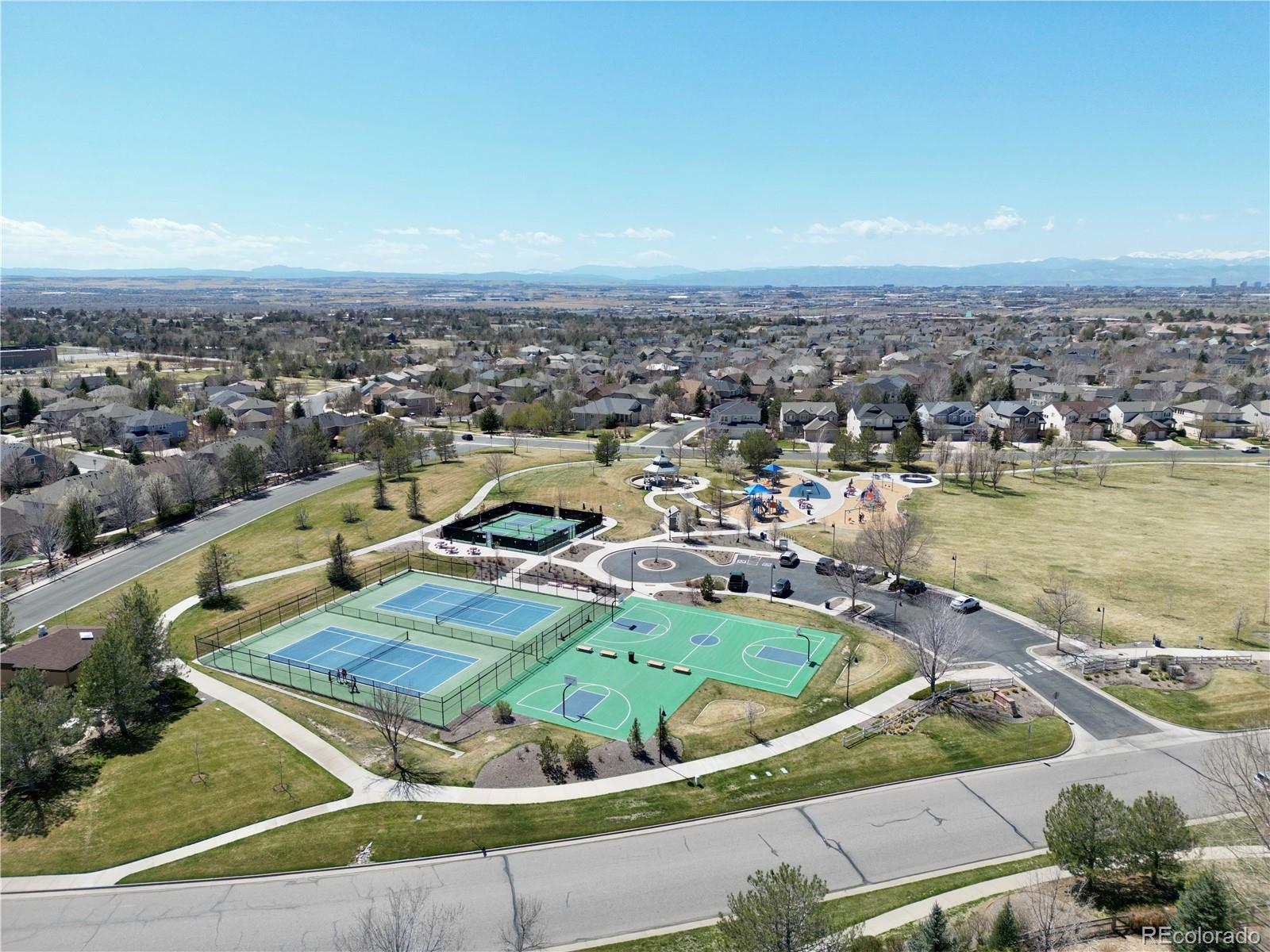 18288 East Caley Place Aurora, CO 80016 - Photo 47 of 50 an aerial view of a house with a swimming pool