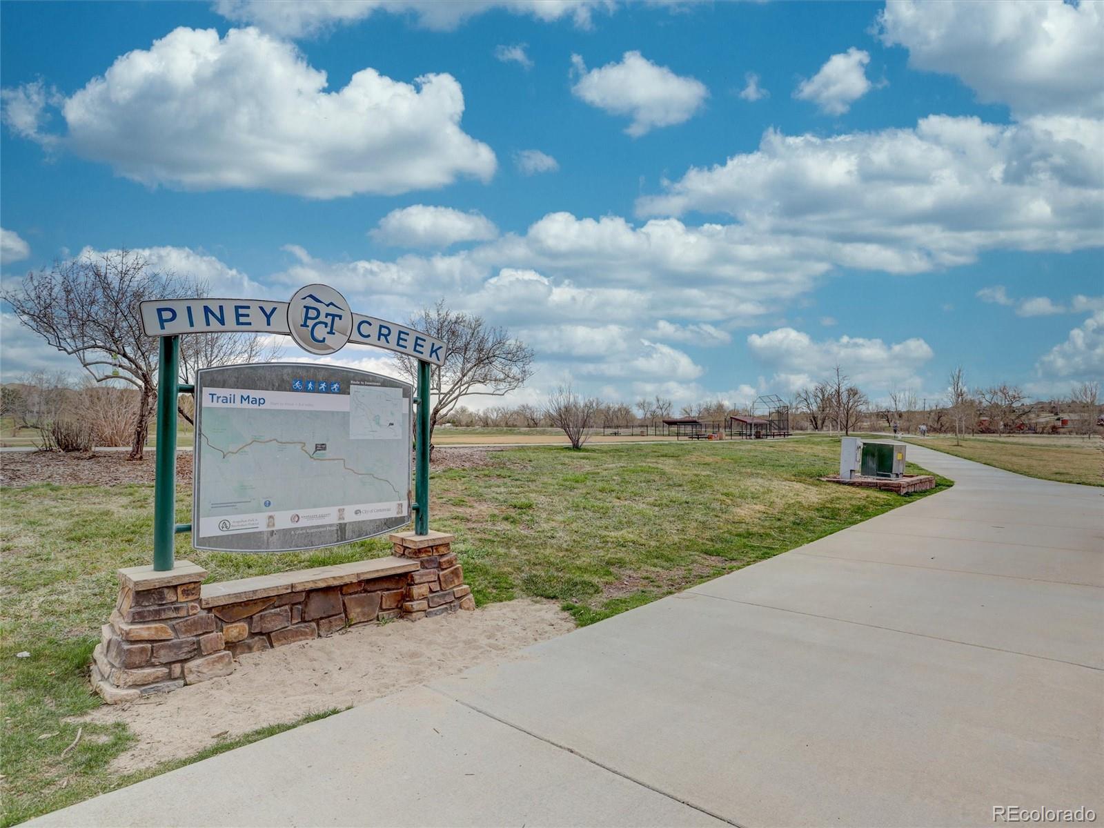 18288 East Caley Place Aurora, CO 80016 - Photo 50 of 50 a view of a terrace with a garden