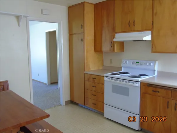 a view of a door and a door in a room