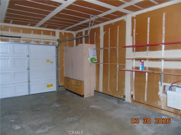 a view of a room with racks on the wall