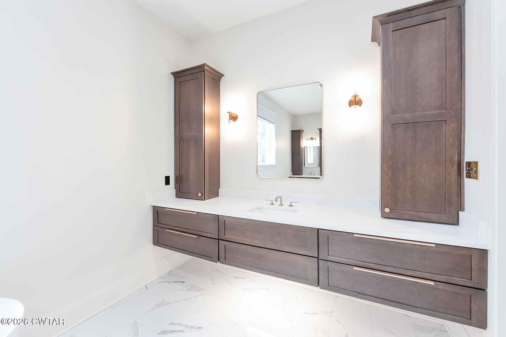 115 Buckingham Cove Jackson, TN 38305 - Photo 24 of 58 a bathroom with a sink and a mirror