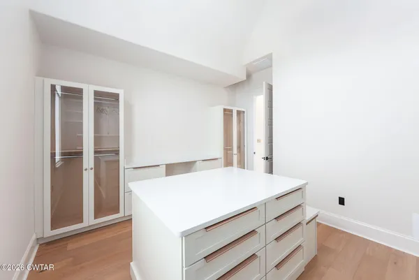 a room with storage and utility