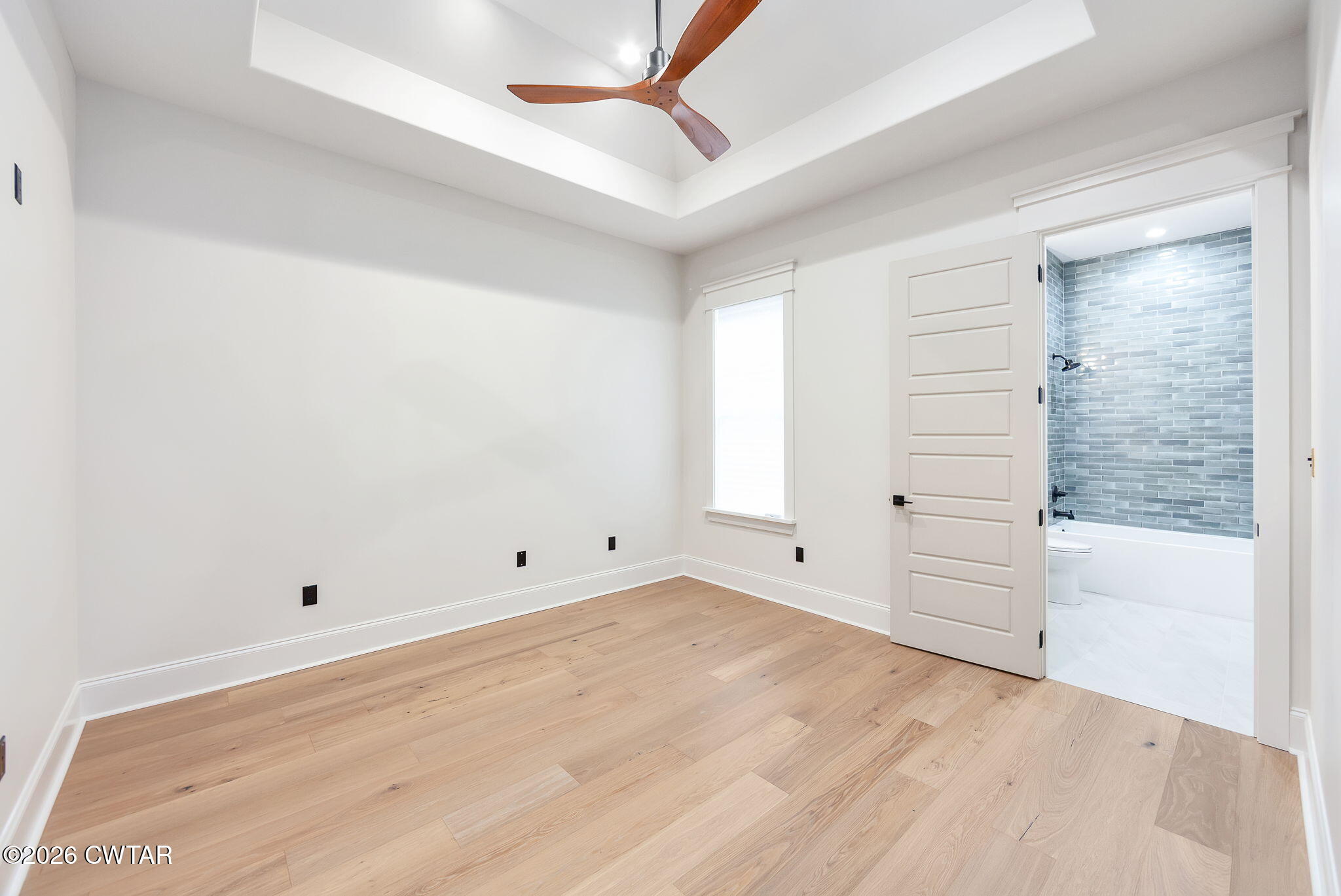 115 Buckingham Cove Jackson, TN 38305 - Photo 28 of 58 wooden floor in an empty room