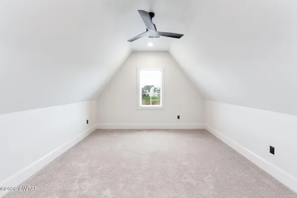 a view of a room with an empty space
