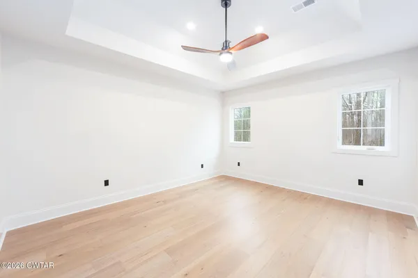 an empty room with windows