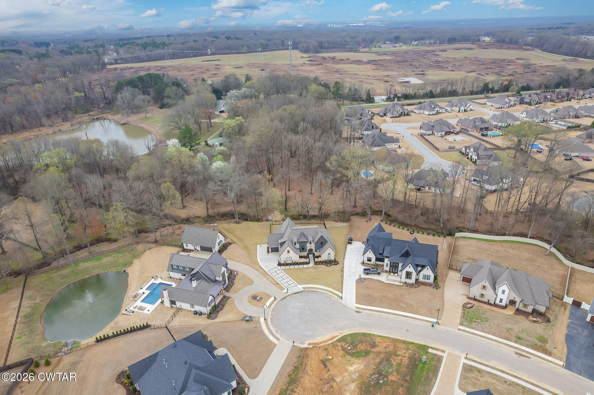 115 Buckingham Cove Jackson, TN 38305 - Photo 4 of 58 an aerial view of a house with outdoor space