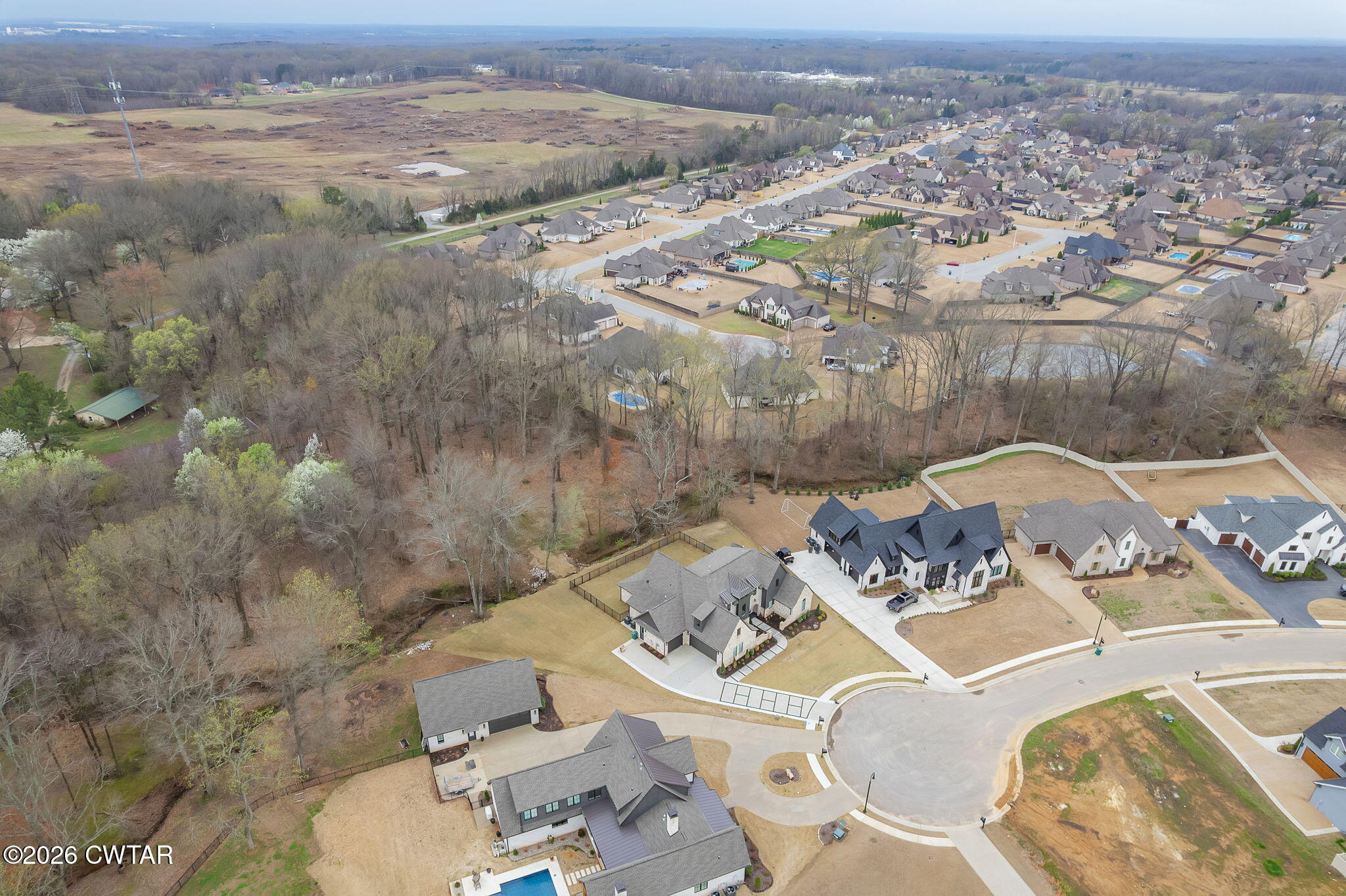 115 Buckingham Cove Jackson, TN 38305 - Photo 51 of 58 an aerial view of a house with yard
