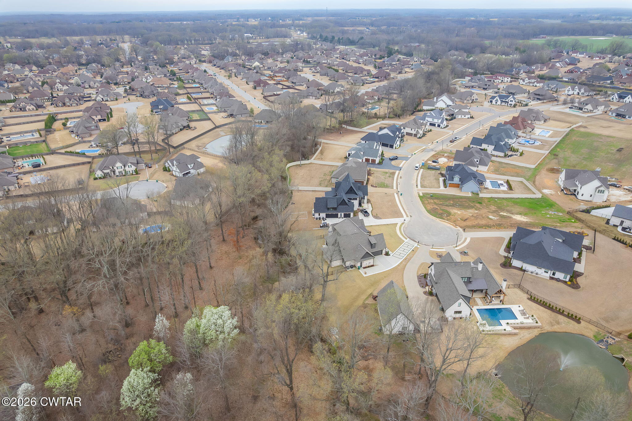 115 Buckingham Cove Jackson, TN 38305 - Photo 52 of 58 an aerial view of residential houses with outdoor space