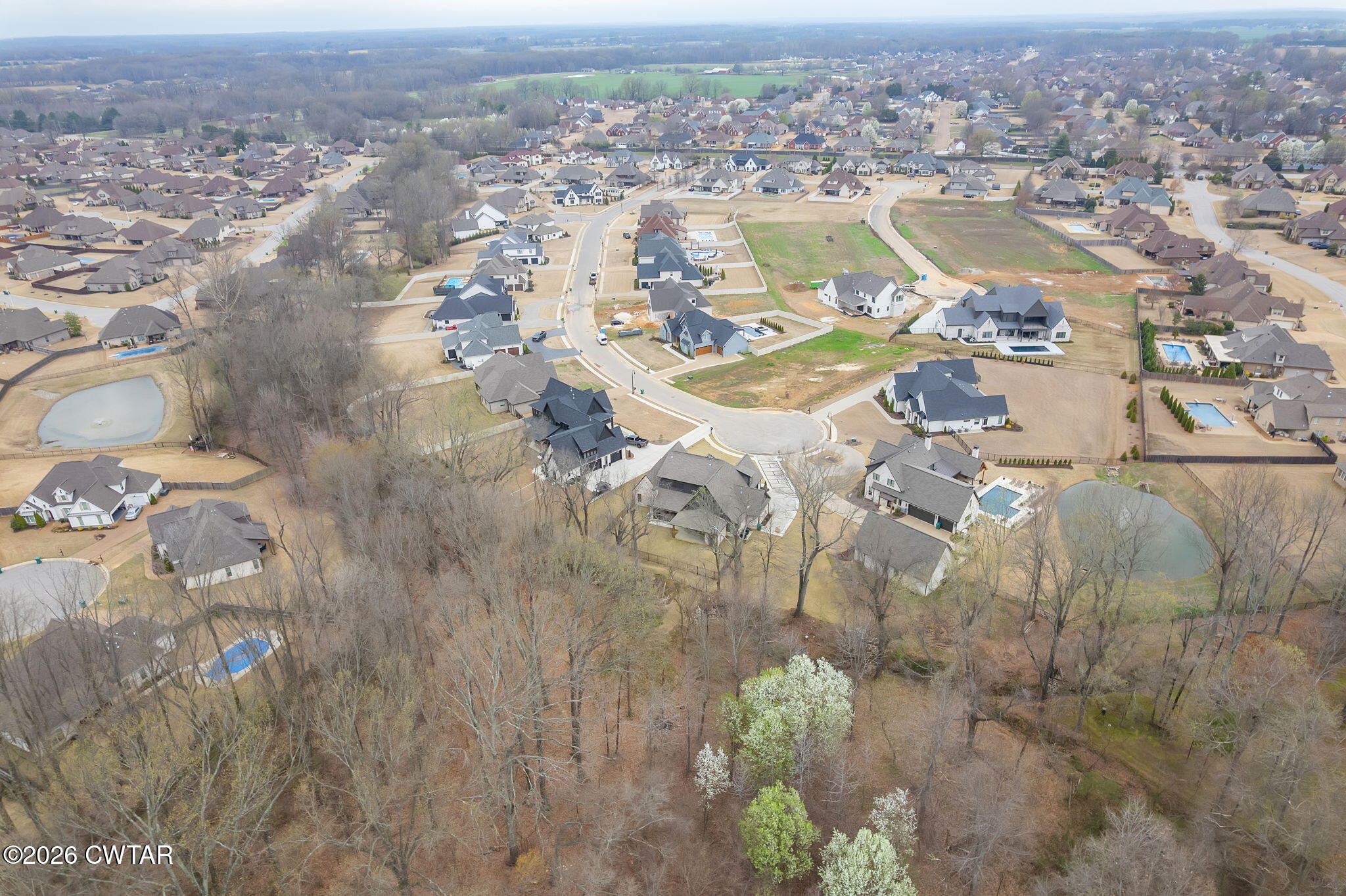 115 Buckingham Cove Jackson, TN 38305 - Photo 53 of 58 an aerial view of residential house with parking space
