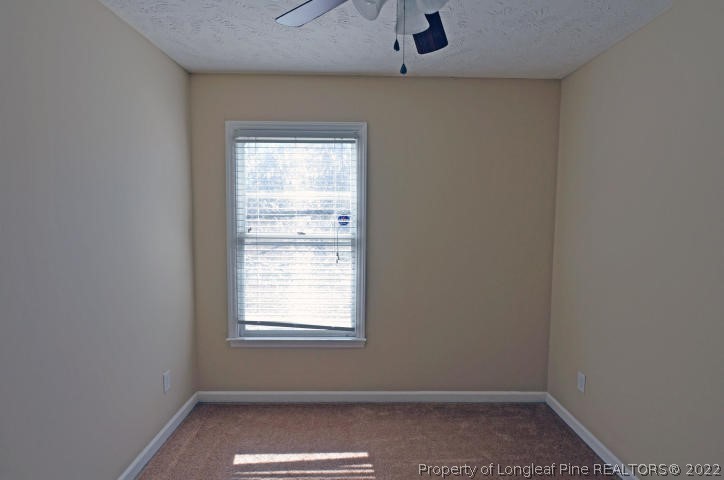 526 Riverwind Drive Spring Lake, NC 28390 - Photo 22 of 29 an empty room with a window