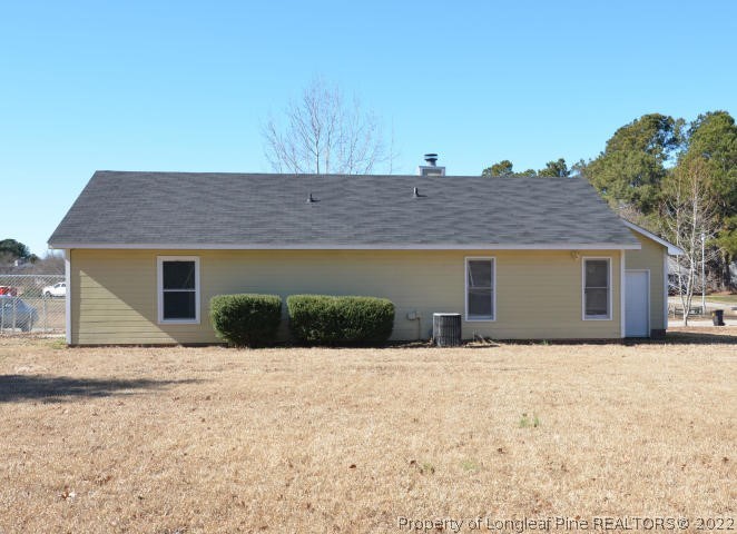 526 Riverwind Drive Spring Lake, NC 28390 - Photo 4 of 29 a front view of house with a yard