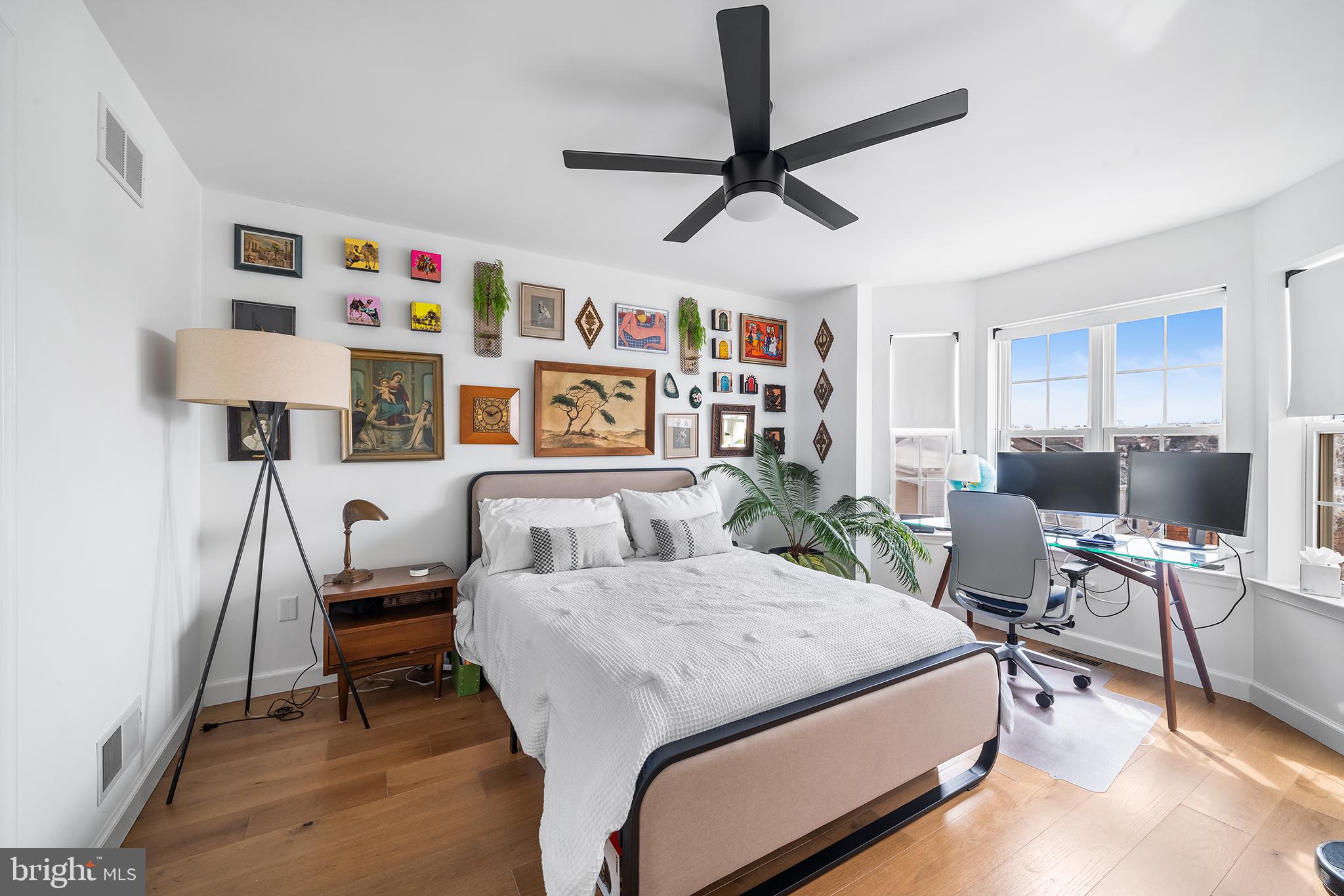 243 Ripka Street Philadelphia, PA 19127 - Photo 15 of 31 a bedroom with a bed furniture and a window