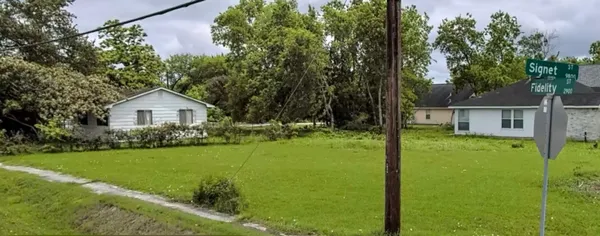 a house view with a garden space