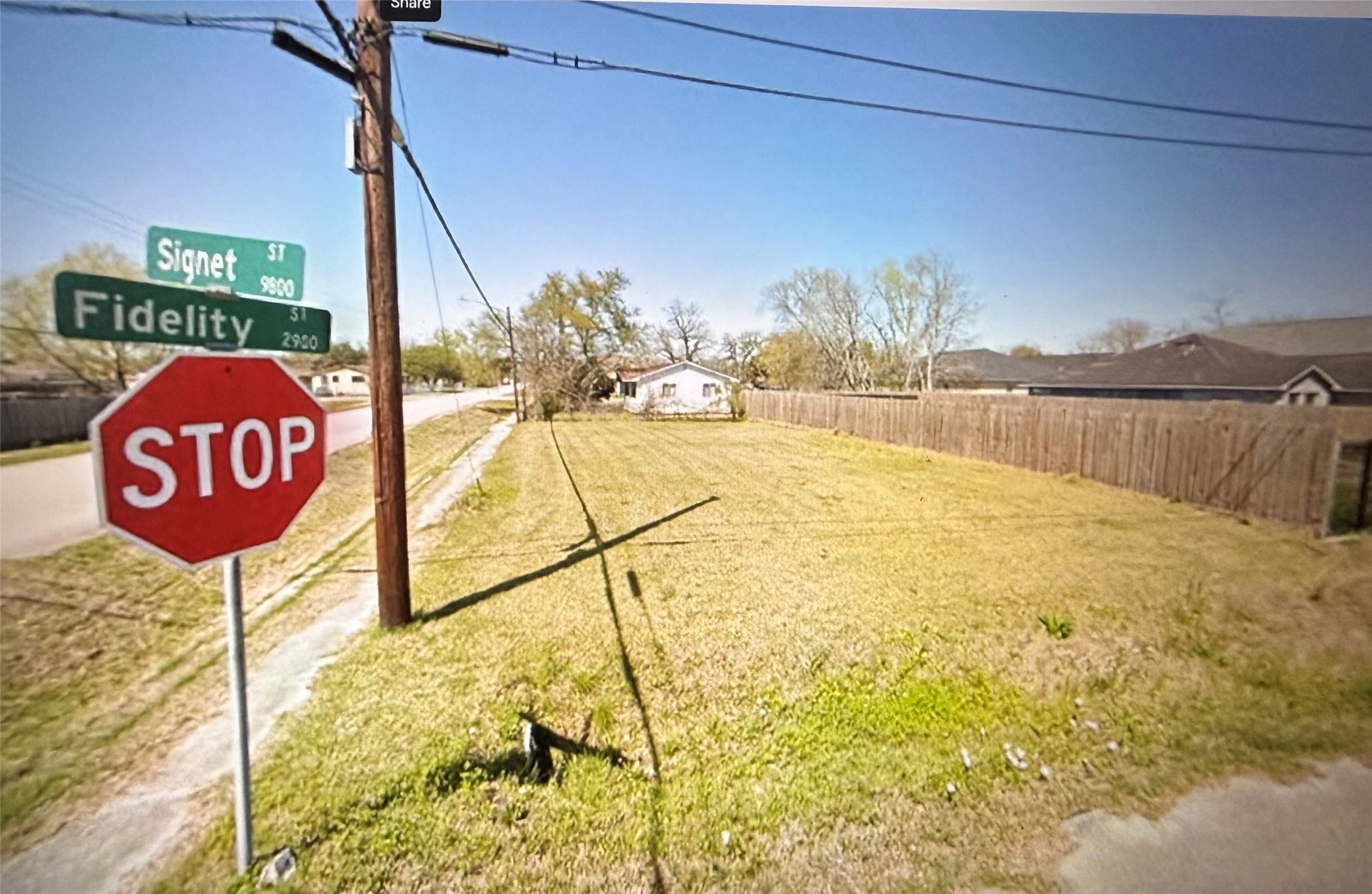 9803 Signet Street Houston, TX 77029 - Photo 2 of 3 a view of a street with an ocean view