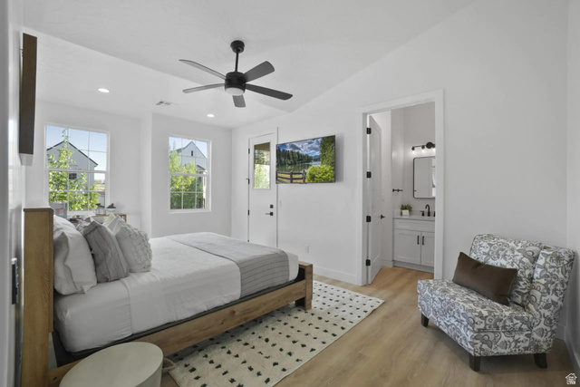 4346 Canterbury Road Hurricane, UT 84737 - Photo 21 of 37 Bedroom with multiple windows, vaulted ceiling, light wood finished floors, ceiling fan, and recessed lighting