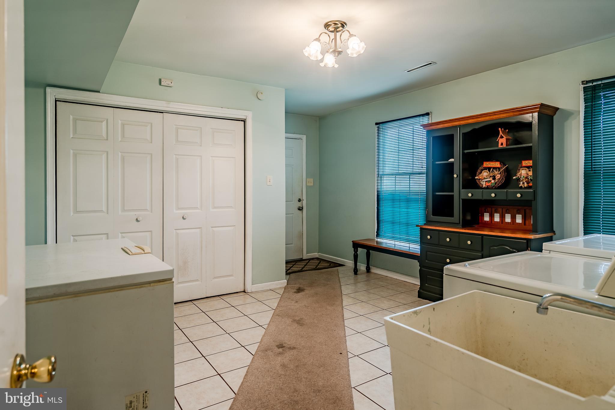 332 Beasley Neck Road Salem, NJ 08079 - Photo 17 of 35 Laundry/Mud Room has access to the garage.