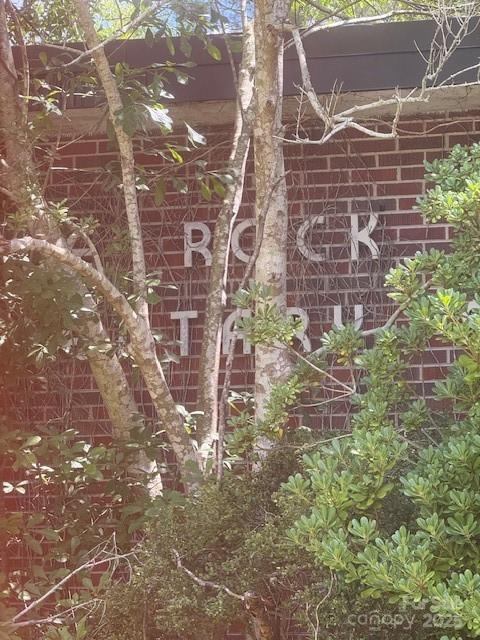 0 Windmill Avenue Dillon, SC 29536 - Photo 18 of 31 a brick building with a yard