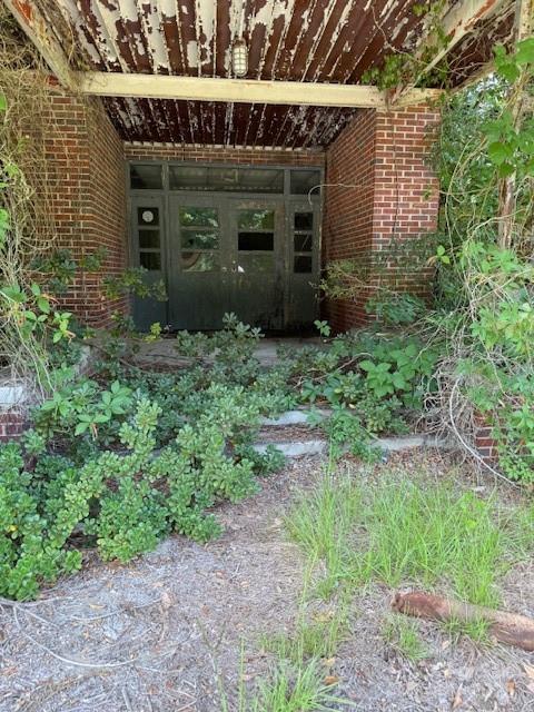 0 Windmill Avenue Dillon, SC 29536 - Photo 20 of 31 a front view of a house with a yard