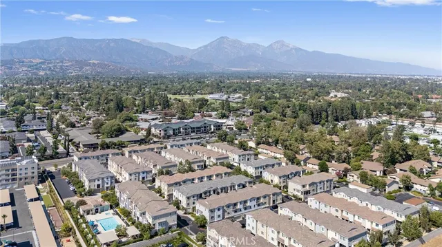 an aerial view of a city with lots of residential buildings