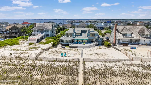 a kitchen with stainless steel appliances kitchen island granite countertop a sink and cabinets