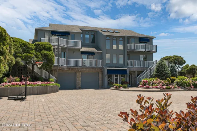 a view of a lake with furniture