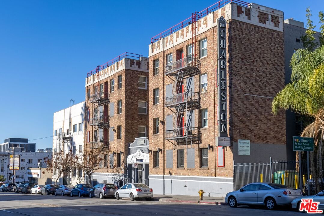 729 South Union Avenue, Unit 207 Los Angeles, CA 90017 - Photo 1 of 19 a city street lined with buildings and cars
