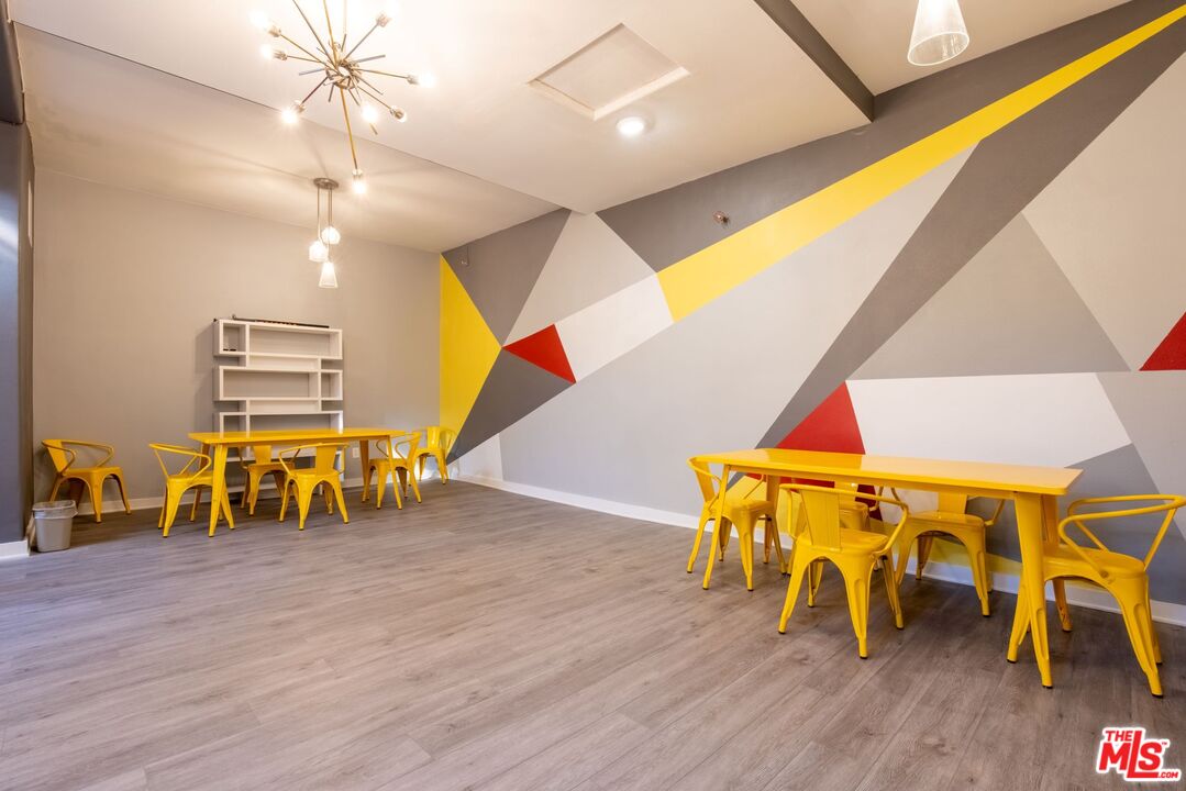 729 South Union Avenue, Unit 207 Los Angeles, CA 90017 - Photo 15 of 19 a view of an outside dining room with wooden floor