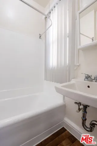 a bathroom with a sink and a bathtub