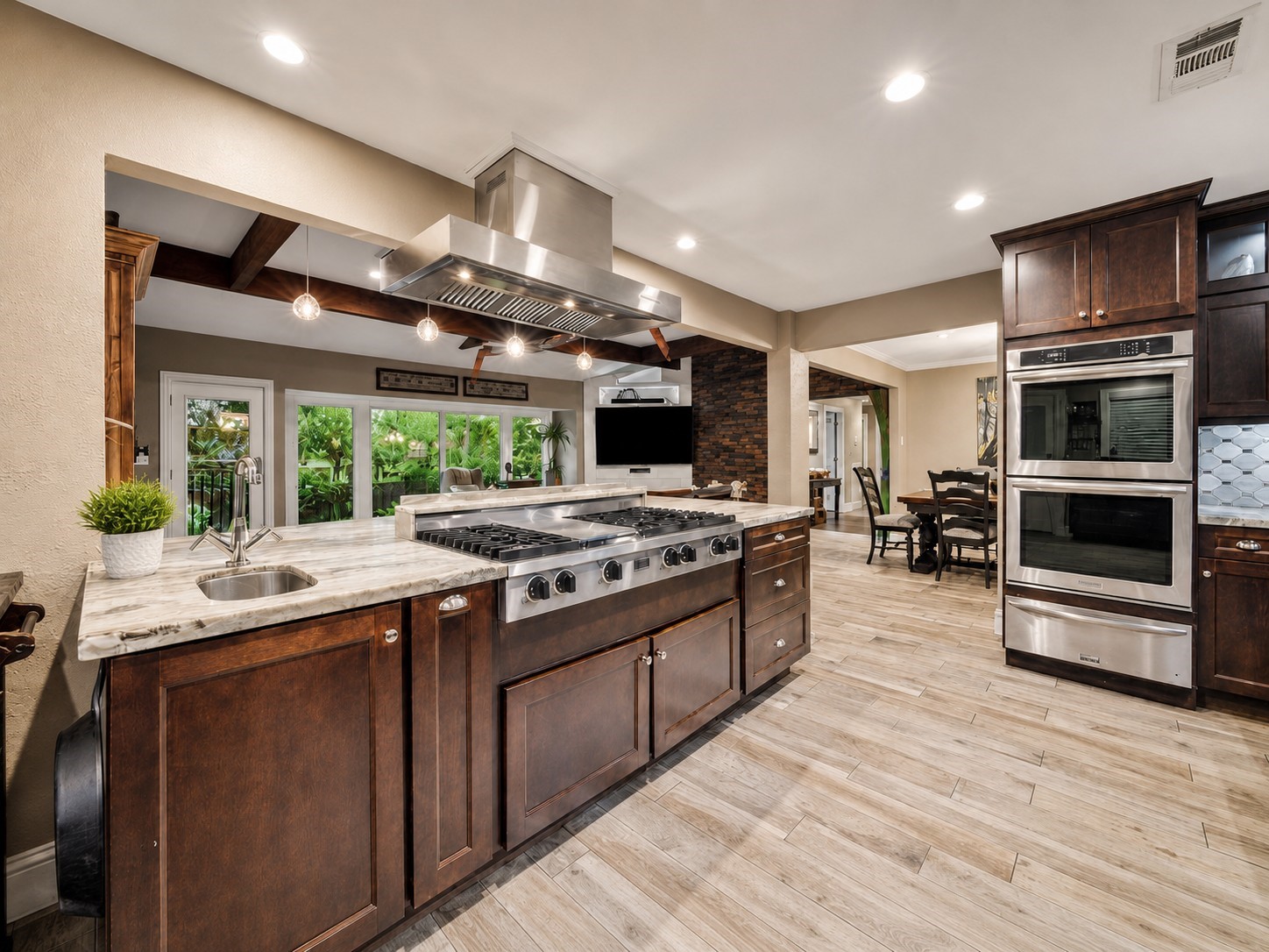 5 Tree Frog Drive Houston, TX 77074 - Photo 5 of 25 a kitchen with stainless steel appliances granite countertop a stove and a sink