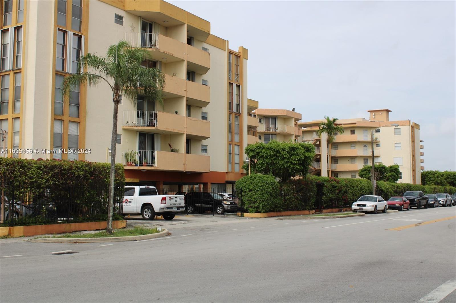 1750 West 46th Street, Unit 433 Hialeah, FL 33012 - Photo 1 of 14 a front view of a building with street view