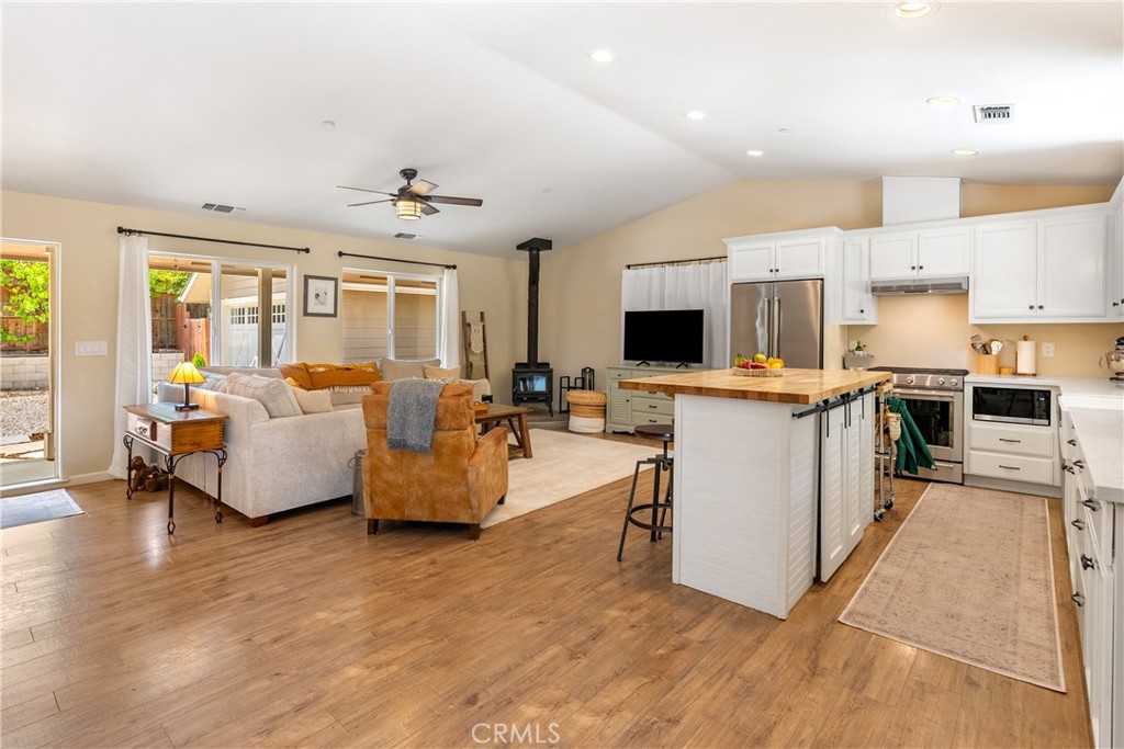 10825 Colorado Road Atascadero, CA 93422 - Photo 12 of 35 a living room with furniture and a flat screen tv