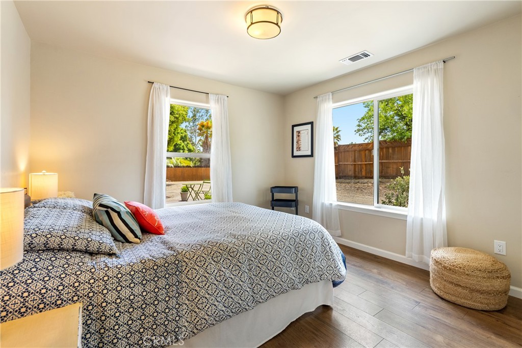 10825 Colorado Road Atascadero, CA 93422 - Photo 21 of 35 a bedroom with a bed and window