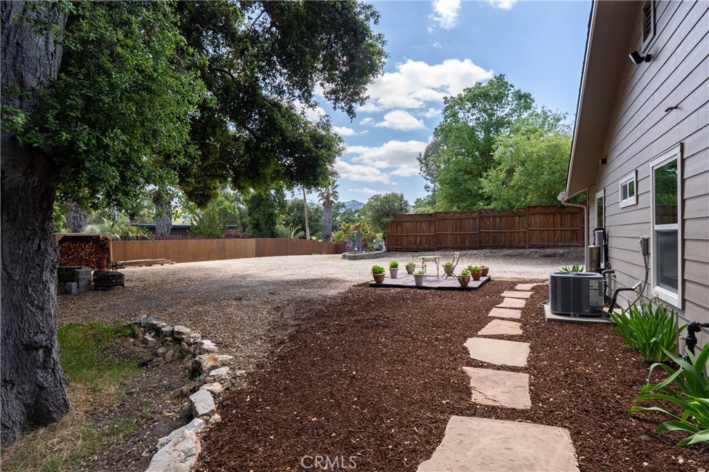 10825 Colorado Road Atascadero, CA 93422 - Photo 32 of 35 a view of backyard with seating area and trees