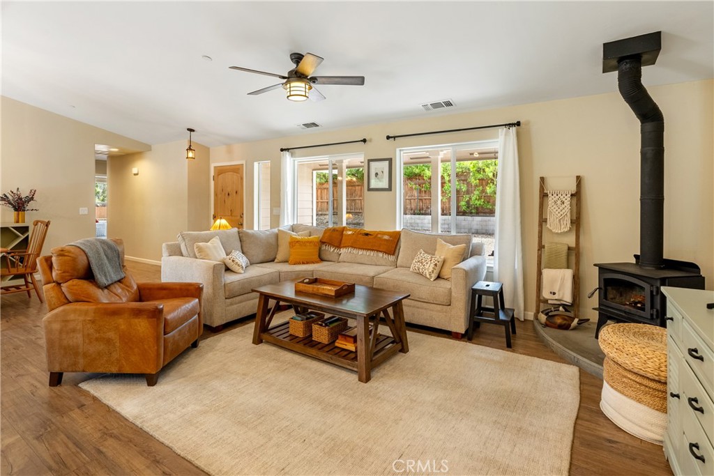10825 Colorado Road Atascadero, CA 93422 - Photo 8 of 35 a living room with furniture and a flat screen tv