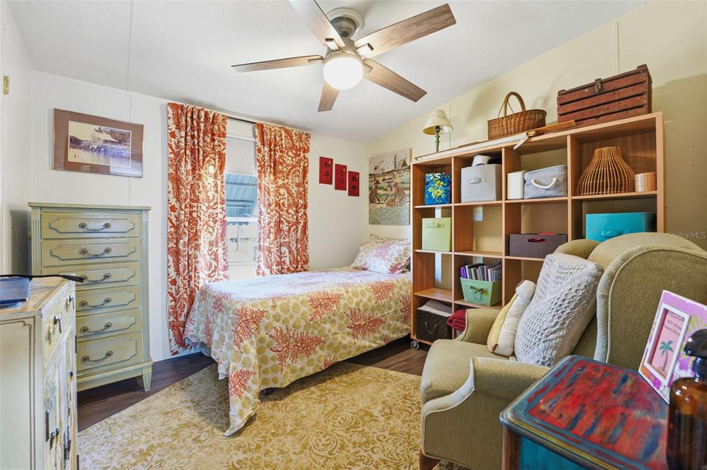 11269 Southwest Welch Avenue Arcadia, FL 34269 - Photo 15 of 41 a bedroom with furniture and a baby crib